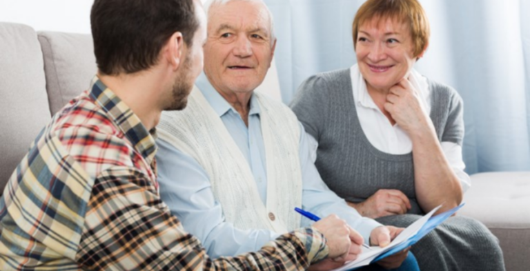Elderly parents talking to son about being a beneficiary
